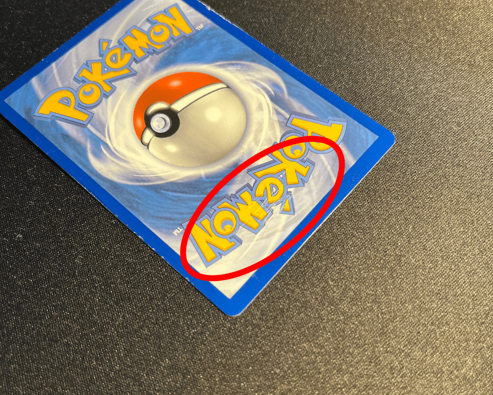 Pokemon Karte beschädigt